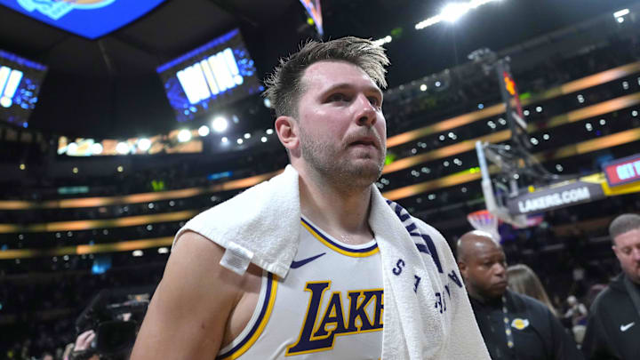 Mar 16, 2025; Los Angeles, California, USA; Los Angeles Lakers guard Luka Doncic (77) reacts after the game against the Phoenix Suns at Crypto.com Arena. Mandatory Credit: Kirby Lee-Imagn Images