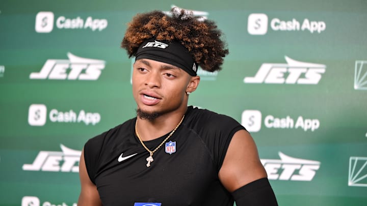 Jun 11, 2025; Florham Park, NY, USA; New York Jets quarterback Justin Fields (7) speaks at a press conference during minicamp at Atlantic Health Jets Training Center. Mandatory Credit: John Jones-Imagn Images