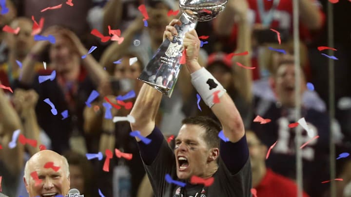Super Bowl 51: New England Patriots quarterback Tom Brady celebrates with the Vince Lombardi Trophy