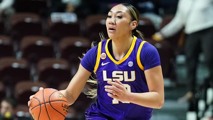 Dec 17, 2024; Uncasville, Connecticut, USA; LSU Lady Tigers guard Last-Tear Poa (13) return the ball against the Seton Hall Pirates in the first half at Mohegan Sun Arena. Mandatory Credit: David Butler II-Imagn Images