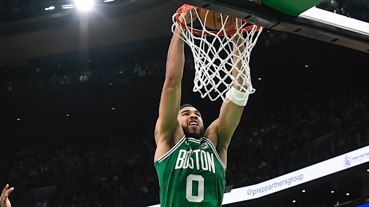 Apr 5, 2024; Boston, Massachusetts, USA; Boston Celtics forward Jayson Tatum (0) dunks the ball
