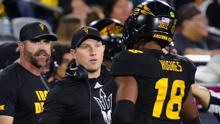 Arizona State head coach Kenny Dillingham greets linebacker Martell Hughes (18) during a game at Mountain America Stadium in Tempe on Sept. 26, 2025. Arizona State head coach Kenny Dillingham greets linebacker Martell Hughes (18) during a game at Mountain America Stadium in Tempe on Sept. 26, 2025.