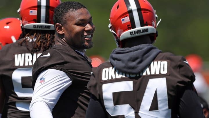 Browns defensive tackle Mike Hall Jr. (51) chats with defensive end Ogbo Okoronkwo during minicamp, Wednesday, June 12, 2024, in Berea. Browns defensive tackle Mike Hall Jr. (51) chats with defensive end Ogbo Okoronkwo during minicamp, Wednesday, June 12, 2024, in Berea.