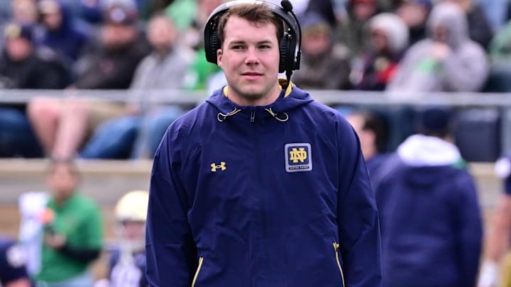 Notre Dame Fighting Irish quarterback Riley Leonard watches practice