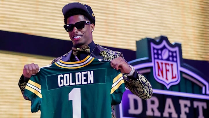 Wide receiver Matthew Golden holds a Green Bay Packers jersey after being selected with the 23rd pick during the first round of the 2025 NFL Draft on Thursday, April 24, 2025, at Lambeau Field in Green Bay, Wisconsin. The draft runs through April 26.