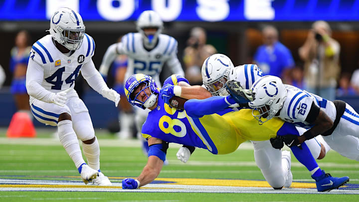 Sep 28, 2025; Inglewood, California, USA; Los Angeles Rams tight end Tyler Higbee (89) is brought down by Indianapolis Colts cornerback Mekhi Blackmon (29) and linebacker Chad Muma (55) during the first half at SoFi Stadium. Mandatory Credit: Gary A. Vasquez-Imagn Images Sep 28, 2025; Inglewood, California, USA; Los Angeles Rams tight end Tyler Higbee (89) is brought down by Indianapolis Colts cornerback Mekhi Blackmon (29) and linebacker Chad Muma (55) during the first half at SoFi Stadium. Mandatory Credit: Gary A. Vasquez-Imagn Images