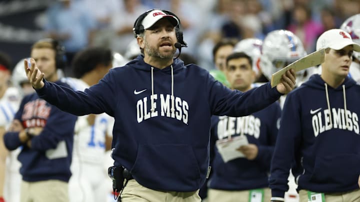 Jan 1, 2026; New Orleans, LA, USA; Mississippi Rebels head coach Pete Golding (center) reacts on the sidelines during the second half of the 2026 Sugar Bowl and quarterfinal game of the College Football Playoff against the Georgia Bulldogs at Caesars Superdome. Mandatory Credit: Amber Searls-Imagn Images