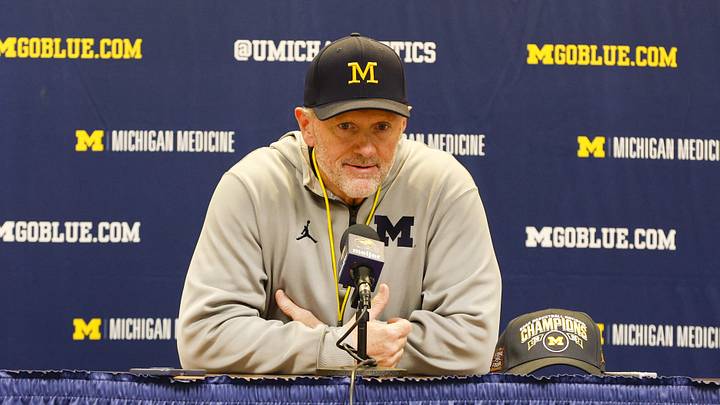 Apr 18, 2026; Ann Arbor, MI, USA; Michigan Wolverines head coach Kyle Whittingham gives remarks following the spring game at Michigan Stadium. Mandatory Credit: Brian Bradshaw Sevald-Imagn Images Apr 18, 2026; Ann Arbor, MI, USA; Michigan Wolverines head coach Kyle Whittingham gives remarks following the spring game at Michigan Stadium. Mandatory Credit: Brian Bradshaw Sevald-Imagn Images