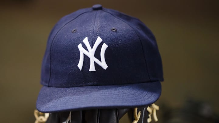 May 18, 2016; Phoenix, AZ, USA; Detailed view of a New York Yankees hat and baseball glove against the Arizona Diamondbacks at Chase Field. Mandatory Credit: Mark J. Rebilas-Imagn Images