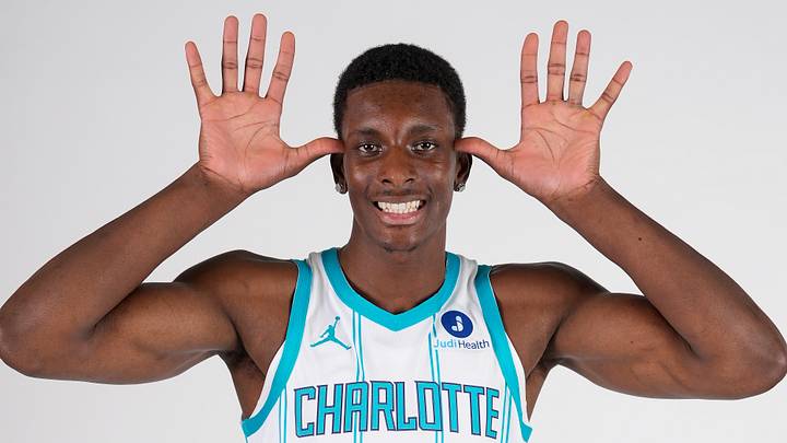 Sep 28, 2026; Charlotte, NC, USA;  Charlotte Hornets player Moussa Diabate (14) poses for photos during media day at the Spectrum Center.  Mandatory Credit: Jim Dedmon-Imagn Images