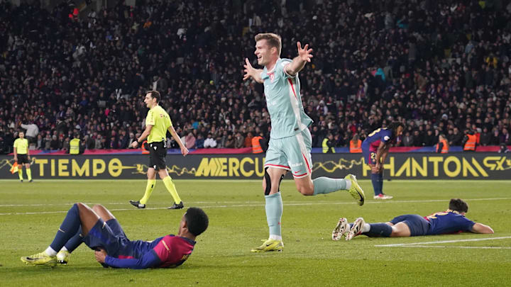 Atlético Madrid stunned Barcelona, beating them 2–1 and taking over first place in La Liga.