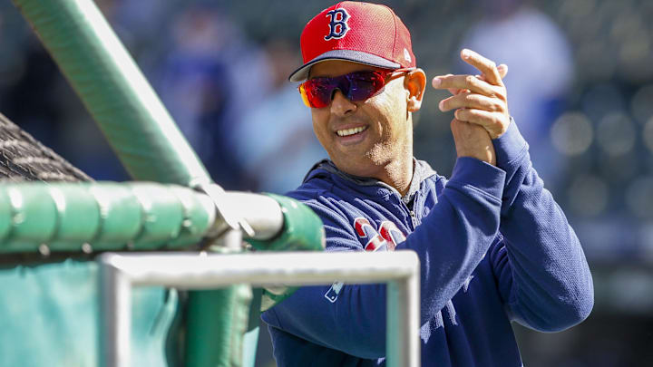 Boston Red Sox manager Alex Cora (20) reacts during batting practice against the Seattle Mariners at T-Mobile Park.