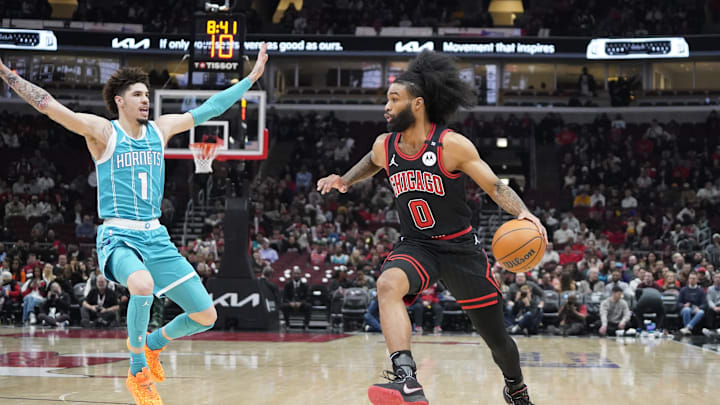 Charlotte Hornets guard LaMelo Ball (1) defends Chicago Bulls guard Coby White