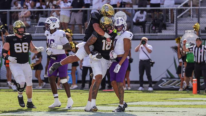 Sep 26, 2026; Orlando, Florida, USA;  UCF Knights tight end Caden Piening (18) celebrates after scoring during the second quarter against the TCU Horned Frogs at Acrisure Bounce House.  Mandatory Credit: Mike Watters-Imagn Images