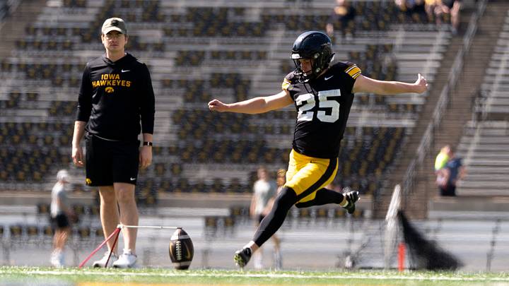 Iowa placekicker Eli Ozick (25) warms up April 25, 2026 during the team’s spring practice at Kinnick Stadium in Iowa City, Iowa.