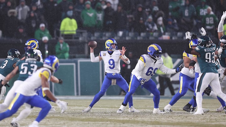 Jan 19, 2025; Philadelphia, Pennsylvania, USA; Los Angeles Rams quarterback Matthew Stafford (9) throws the ball in the second half against the Philadelphia Eagles in a 2025 NFC divisional round game at Lincoln Financial Field. Mandatory Credit: Bill Streicher-Imagn Images