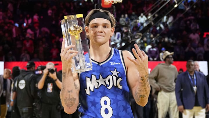 Feb 15, 2025; San Francisco, CA, USA; Osceola Magic guard Mac McClung celebrates with the trophy after winning the slam dunk competition during All Star Saturday Night ahead of the 2025 NBA All Star Game at Chase Center. Mandatory Credit: Kyle Terada-Imagn Images