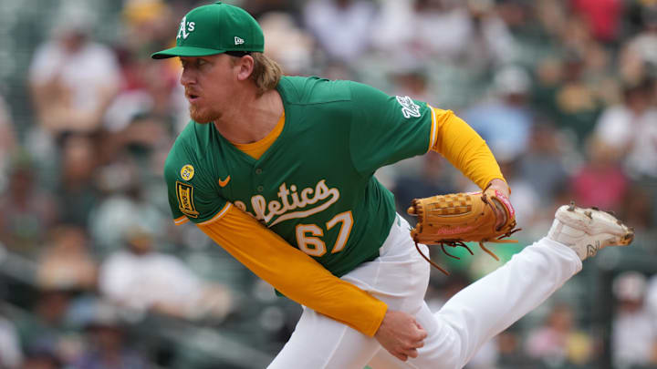 Jun 8, 2025; West Sacramento, California, USA; Athletics pitcher Grant Holman (67) throws a pitch against the Baltimore Orioles during the eighth inning at Sutter Health Park. Mandatory Credit: Darren Yamashita-Imagn Images
