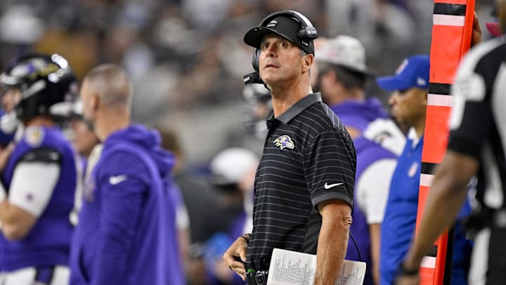 Aug 16, 2025; Arlington, Texas, USA; Baltimore Ravens head coach John Harbaugh looks on during the second half against the Dallas Cowboys at AT&T Stadium. Mandatory Credit: Jerome Miron-Imagn Images