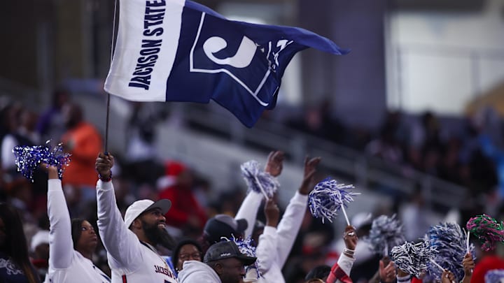 Dec 14, 2024; Atlanta, GA, USA; Jackson State Tigers fans wave a flag against the South Carolina State Bulldogs in the fourth quarter at Mercedes-Benz Stadium. Mandatory Credit: Brett Davis-Imagn Images