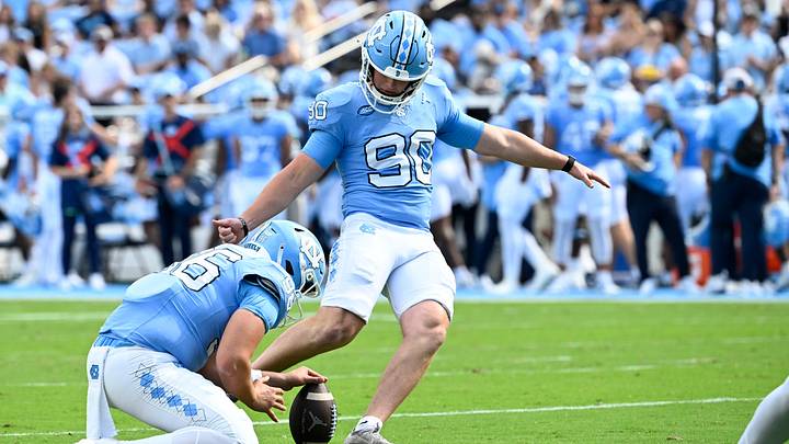 Sep 13, 2025; Chapel Hill, North Carolina, USA; North Carolina Tar Heels place kicker Rece Verhoff (90) kicks a field goal in the first quarter at Kenan Stadium. Mandatory Credit: Bob Donnan-Imagn Images