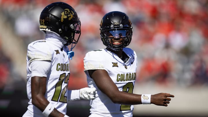 Oct 19, 2024; Tucson, Arizona, USA; Colorado Buffalos quarterback Shedeur Sanders (2) with wide receiver Travis Hunter (12) against the Arizona Wildcats at Arizona Stadium. Mandatory Credit: Mark J. Rebilas-Imagn Images