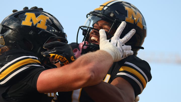 Sep 6, 2025; Columbia, Missouri, USA; Missouri Tigers wide receiver Donovan Olugbode (1) celebrates tight end Brett Norfleet's (87) touchdown in the second half of the Border War at Faurot Field at Memorial Stadium.