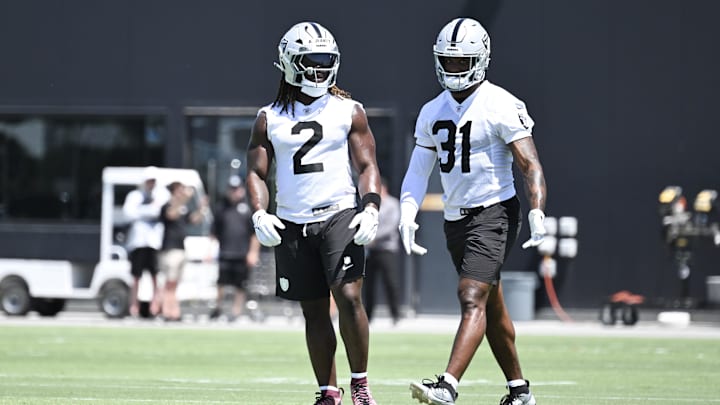 Jun 10, 2025; Henderson, NV, USA; Las Vegas Raiders running back Ashton Jeanty (2) and running back Raheem Mostert (31) between drills during Las Vegas Raiders Minicamp at Intermountain Health Performance Center. Mandatory Credit: Candice Ward-Imagn Images
