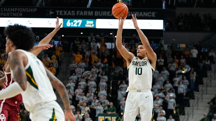 Feb 13, 2024; Waco, Texas, USA;  Baylor Bears guard RayJ Dennis (10) scores a three point basket. 