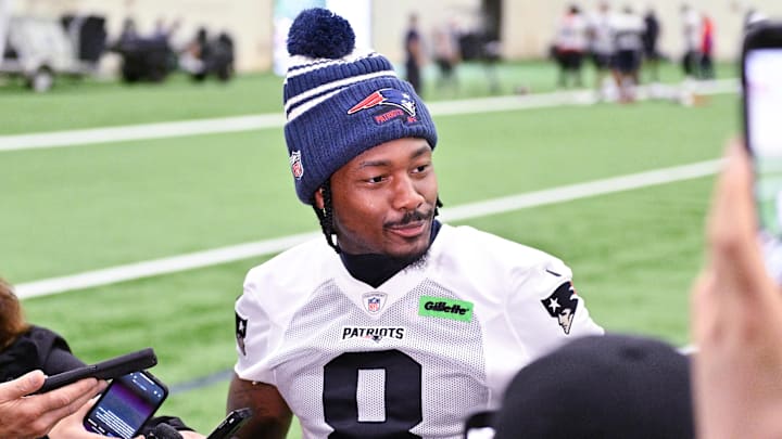 Jun 10, 2025; Foxborough, MA, USA; New England Patriots wide receiver Stefon Diggs (8) speaks to the media after minicamp held in the WIN Field House at Gillette Stadium. Mandatory Credit: Eric Canha-Imagn Images Jun 10, 2025; Foxborough, MA, USA; New England Patriots wide receiver Stefon Diggs (8) speaks to the media after minicamp held in the WIN Field House at Gillette Stadium. Mandatory Credit: Eric Canha-Imagn Images