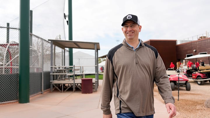 Reds president of baseball operations Nick Krall walks between fields at the Cincinnati Reds Player Development Complex in Goodyear, Ariz., on Wednesday, Feb. 12, 2025. Reds president of baseball operations Nick Krall walks between fields at the Cincinnati Reds Player Development Complex in Goodyear, Ariz., on Wednesday, Feb. 12, 2025.