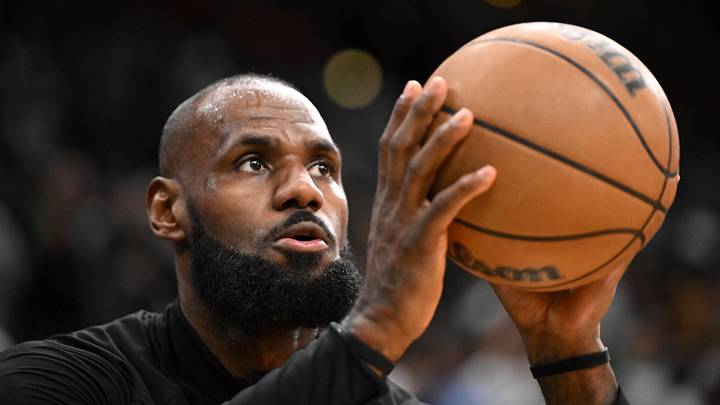 Los Angeles Lakers forward LeBron James (23) takes a shot during warmups before a game against the Boston Celtics  at the TD Garden. 