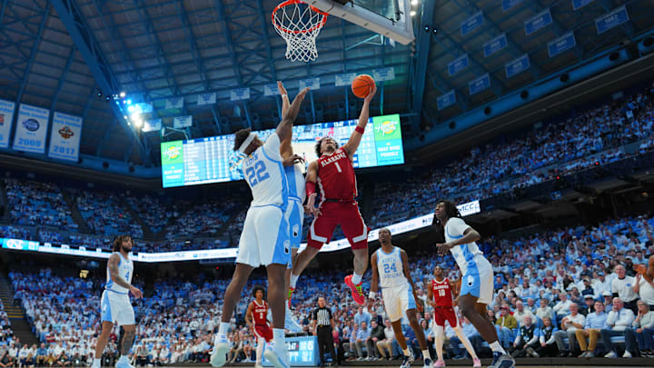 Dec 4, 2024; Chapel Hill, North Carolina, USA; Alabama Crimson Tide guard Mark Sears (1) shoots as North Carolina Tar Heels forward Ven-Allen Lubin (22) defends in the first half at Dean E. Smith Center. Mandatory Credit: Bob Donnan-Imagn Images Dec 4, 2024; Chapel Hill, North Carolina, USA; Alabama Crimson Tide guard Mark Sears (1) shoots as North Carolina Tar Heels forward Ven-Allen Lubin (22) defends in the first half at Dean E. Smith Center. Mandatory Credit: Bob Donnan-Imagn Images