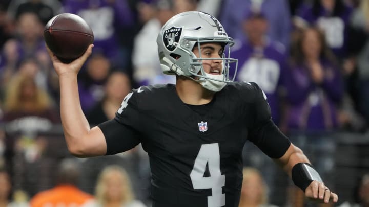 Dec 10, 2023; Paradise, Nevada, USA; Las Vegas Raiders quarterback Aidan O'Connell (4) throws the ball against the Minnesota Vikings in the first half at Allegiant Stadium. Mandatory Credit: Kirby Lee-USA TODAY Sports