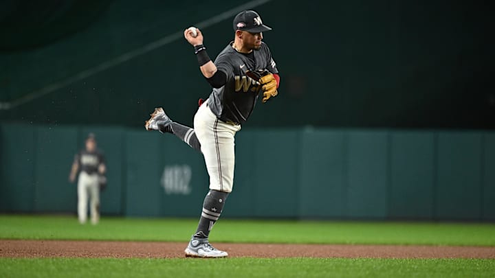 Sep 27, 2024; Washington, District of Columbia, USA;  Washington Nationals second baseman Ildemaro Vargas (14) throws to first base during the seventh inning against the Philadelphia Phillies at Nationals Park. 