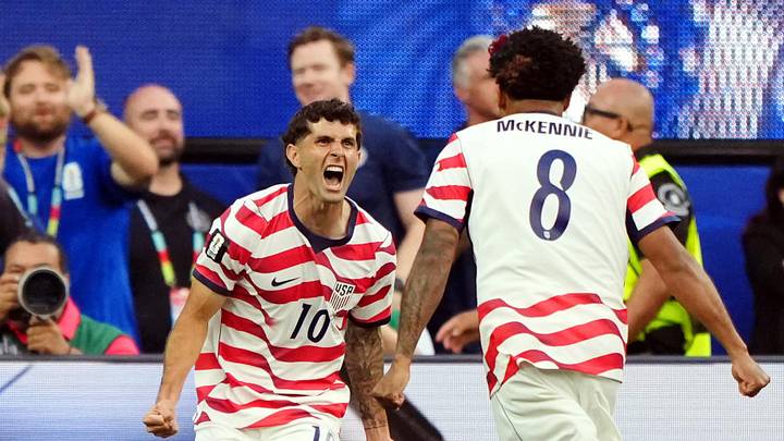 June 12, 2026; Inglewood, California, U.S.; Christian Pulisic of the U.S. celebrates with teammates their first goal, an own goal scored by Paraguay's Damian Bobadilla.  Mandatory Credit: Kirby Lee-Imagn Images 
