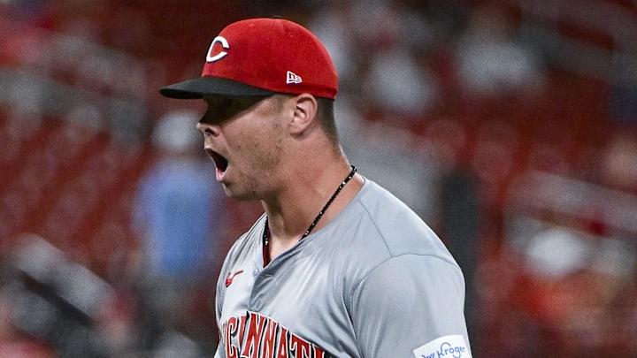 Sep 10, 2024; St. Louis, Missouri, USA;  Cincinnati Reds relief pitcher Emilio Pagan (15) reacts after the Reds defeated the St. Louis Cardinals at Busch Stadium. Mandatory Credit: Jeff Curry-Imagn Images