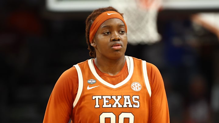 Apr 3, 2026; Phoenix, AZ, USA; Texas Longhorns center Kyla Oldacre (00) against the UCLA Bruins during a semifinal of the Final Four of the women's 2026 NCAA Tournament at Mortgage Matchup Center. Mandatory Credit: Mark J. Rebilas-Imagn Images
