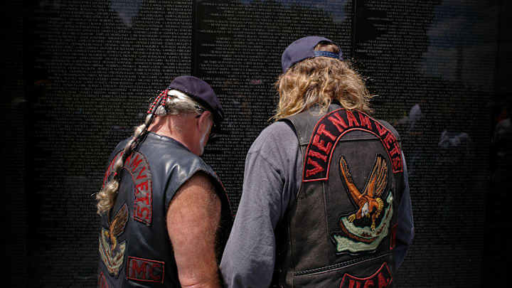 Two Vietnam War veterans at the Vietnam Veterans Memorial.