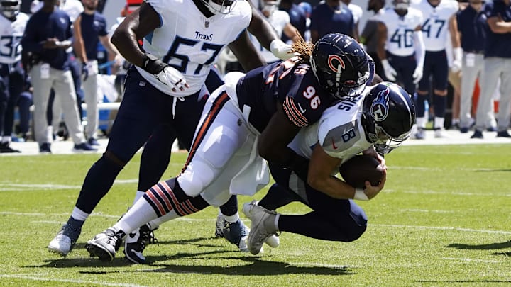 Aug 12, 2023; Chicago, Illinois, USA; Chicago Bears defensive tackle Zacch Pickens (96) sacks Tennessee Titans quarterback Will Levis (8) during the first quarter at Soldier Field. Mandatory Credit: David Banks-Imagn Images