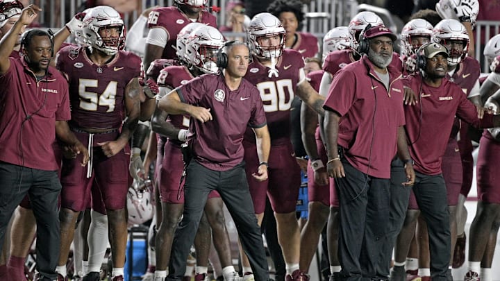Sep 21, 2024; Tallahassee, Florida, USA; Florida State Seminoles head coach Mike Norvell and his team watch the time tick off of the clock during the fourth quarter against the California Golden Bears at Doak S. Campbell Stadium. Mandatory Credit: Melina Myers-Imagn Images