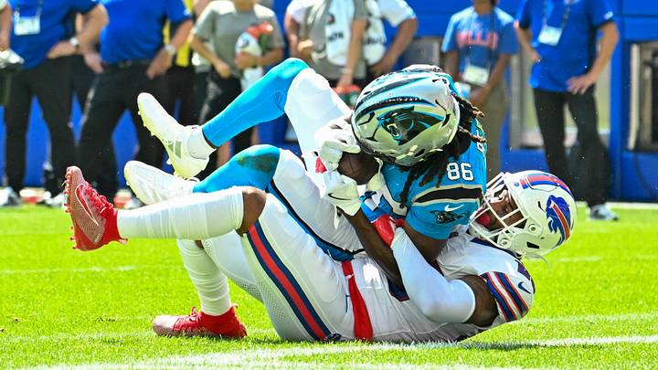 Aug 15, 2026; Orchard Park, New York, USA; Carolina Panthers wide receiver Ja'seem Reed (86) scores a touchdown on the tackle by Buffalo Bills defensive back Geno Stone (25) in the second quarter at the New Highmark Stadium. Mandatory Credit: Mark Konezny-Imagn Images