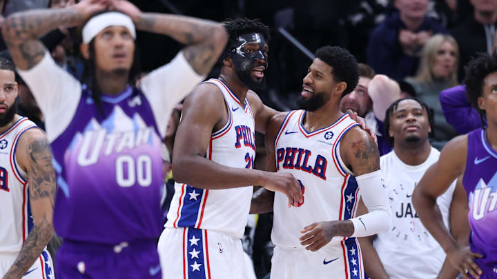 Dec 28, 2024; Salt Lake City, Utah, USA; Philadelphia 76ers center Joel Embiid (21) and forward Paul George (8) react to a play against the Utah Jazz during the fourth quarter at Delta Center. Mandatory Credit: Rob Gray-Imagn Images Dec 28, 2024; Salt Lake City, Utah, USA; Philadelphia 76ers center Joel Embiid (21) and forward Paul George (8) react to a play against the Utah Jazz during the fourth quarter at Delta Center. Mandatory Credit: Rob Gray-Imagn Images