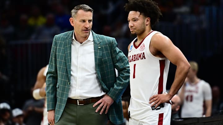 Mar 23, 2025; Cleveland, OH, USA; Alabama Crimson Tide head coach Nate Oats coaches guard Mark Sears (1) in the second half against the St. Mary's Gaels during the NCAA Tournament Second Round at Rocket Arena. Mandatory Credit: Ken Blaze-Imagn Images