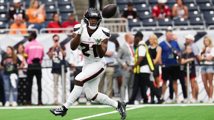 Sep 15, 2025; Houston, Texas, USA;  Houston Texans running back Nick Chubb (21) warms up before the game against the Tampa Bay Buccaneers at NRG Stadium. 