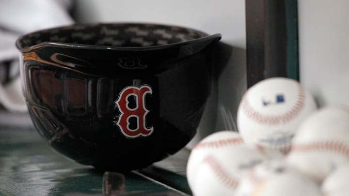 May 24, 2014; St. Petersburg, FL, USA; Boston Red Sox helmet lays in the dugout against the Tampa Bay Rays at Tropicana Field. Mandatory Credit: Kim Klement-Imagn Images