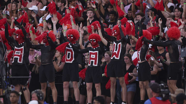 Oct 18, 2025; Athens, Georgia, USA; Georgia Bulldogs fans cheer during the fourth quarter of the game against the Mississippi Rebels at Sanford Stadium. Mandatory Credit: Brett Davis-Imagn Images Oct 18, 2025; Athens, Georgia, USA; Georgia Bulldogs fans cheer during the fourth quarter of the game against the Mississippi Rebels at Sanford Stadium. Mandatory Credit: Brett Davis-Imagn Images