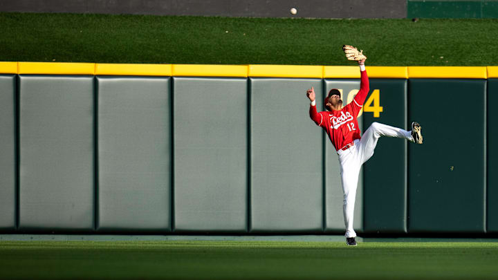 Cincinnati Reds outfielder Bubba Thompson (12) drops a fly ball hit by Los Angeles Angels designated hitter Miguel Sanó (22) in the first inning of the MLB game between the Cincinnati Reds and the Los Angeles Angels at Great American Ball Park in Cincinnati on Saturday, April 20, 2024.