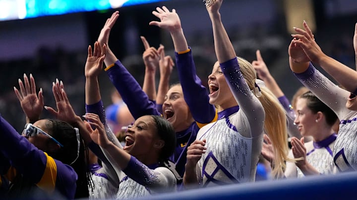 LSU gymnast LSU gymnast Livvy Dunne celebrates with teammates during Session 2 of the SEC Gymnastics Championship at Legacy Arena in Birmingham, Alabama.