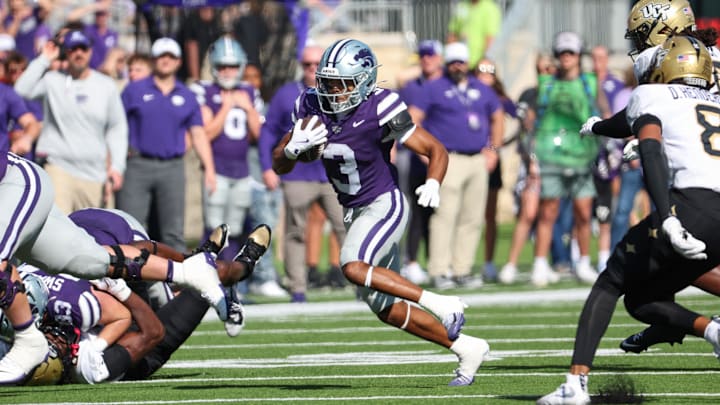 Sep 27, 2025; Manhattan, Kansas, USA; Kansas State Wildcats running back Dylan Edwards (3) finds room to run during the first quarter against the UCF Knights at Bill Snyder Family Football Stadium. Sep 27, 2025; Manhattan, Kansas, USA; Kansas State Wildcats running back Dylan Edwards (3) finds room to run during the first quarter against the UCF Knights at Bill Snyder Family Football Stadium.